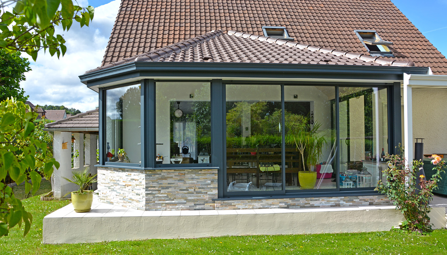 Extension de maison avec un toit tuile