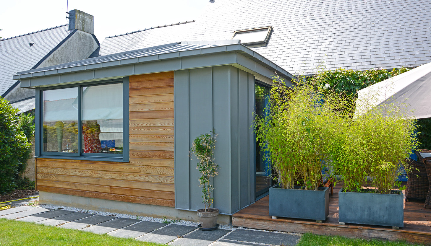 Extension de maison avec un toit zinc