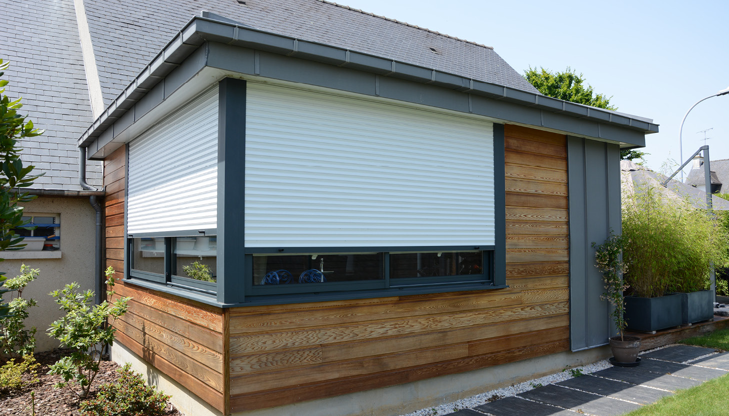 Extension de maison avec un toit zinc